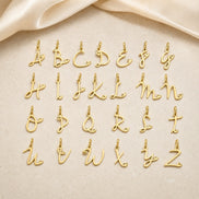 Amour Initial Charm in gold tone featuring heart