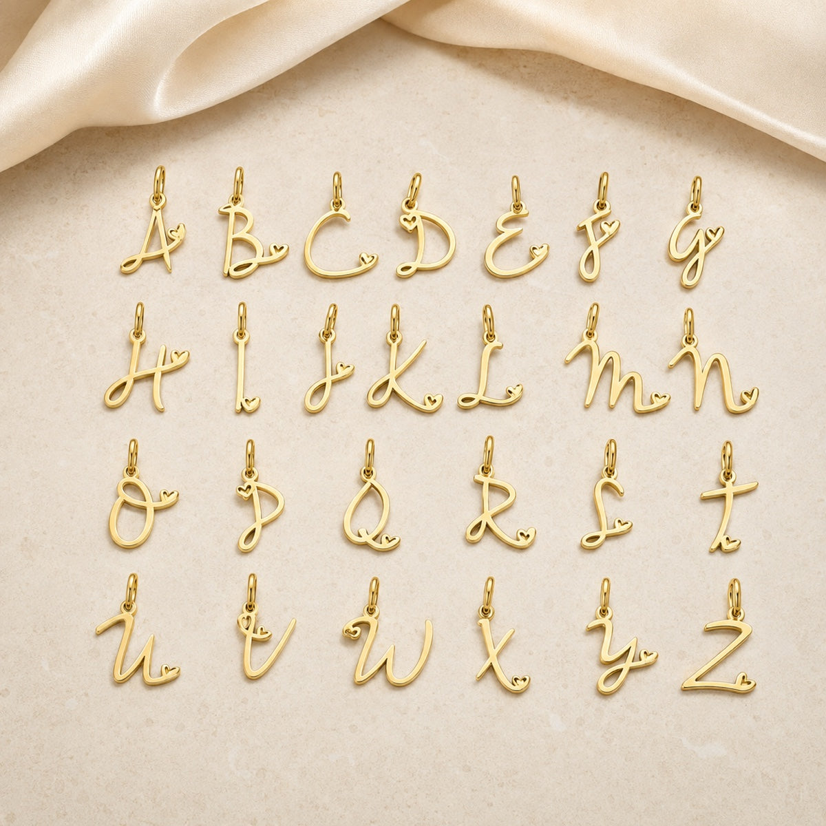 Amour Initial Charm in gold tone featuring heart