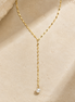 Avery Pearl Lariat in gold tone featuring pearl accent