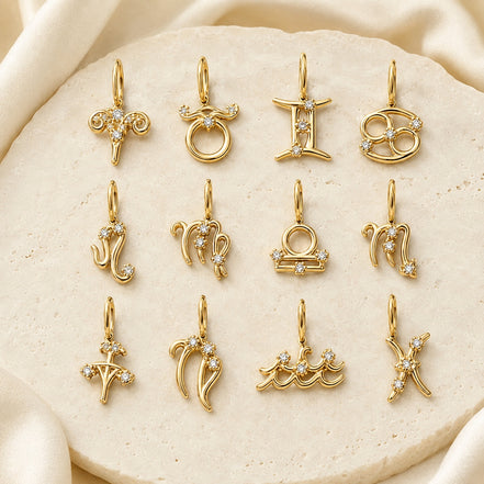 Celeste Zodiac Charm in gold tone featuring crystal accent