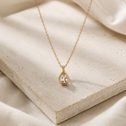 Aurora Teardrop Necklace with crystal accents in gold tone