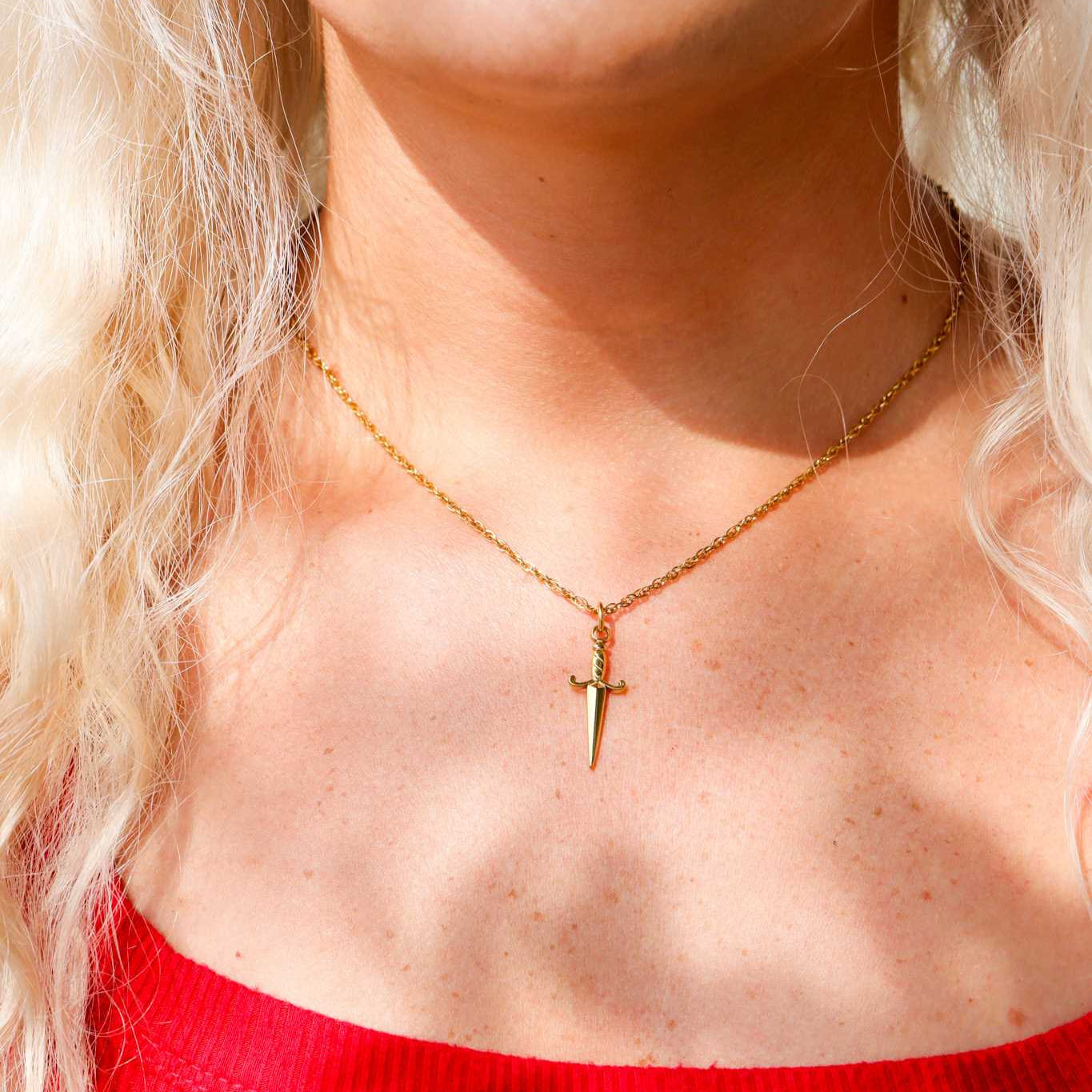 Chain necklace with sword pendant life style