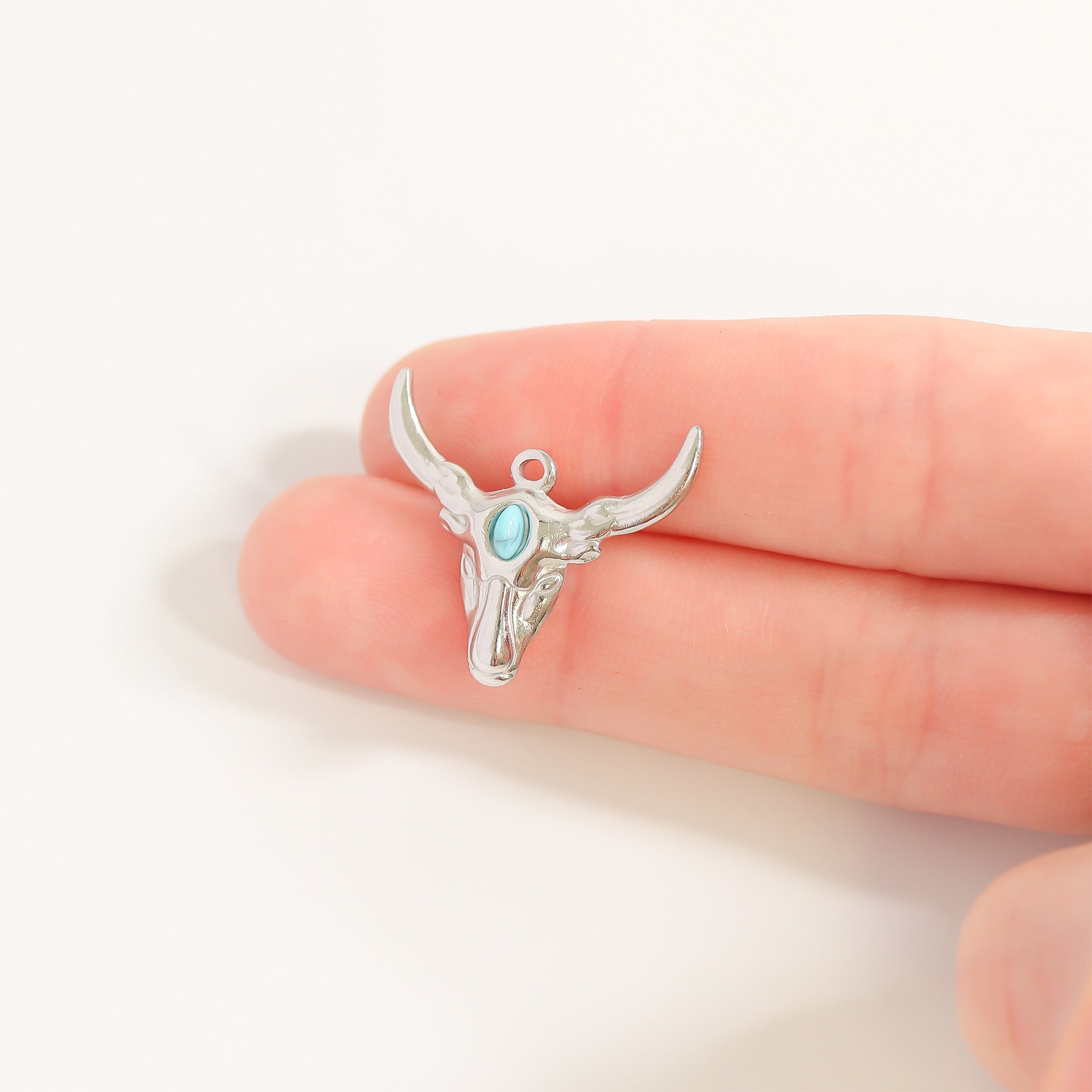 Longhorn bull pendant with turquoise stone in forehead scale