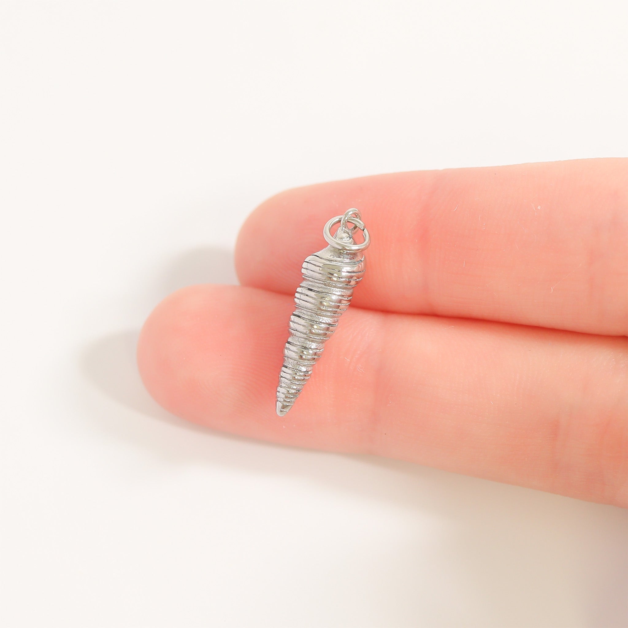 horn shell pendant scale