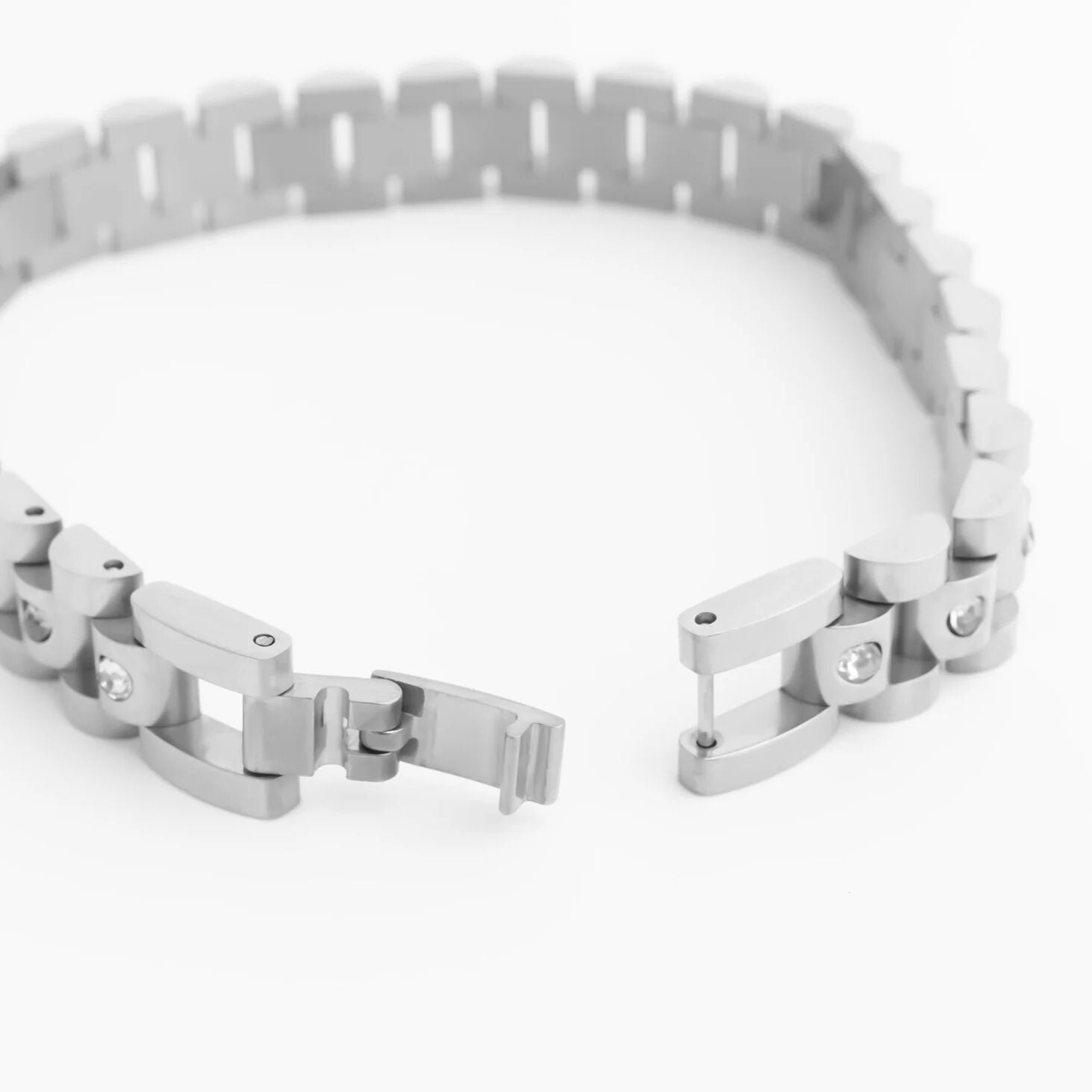Silver chain bracelet on a white background