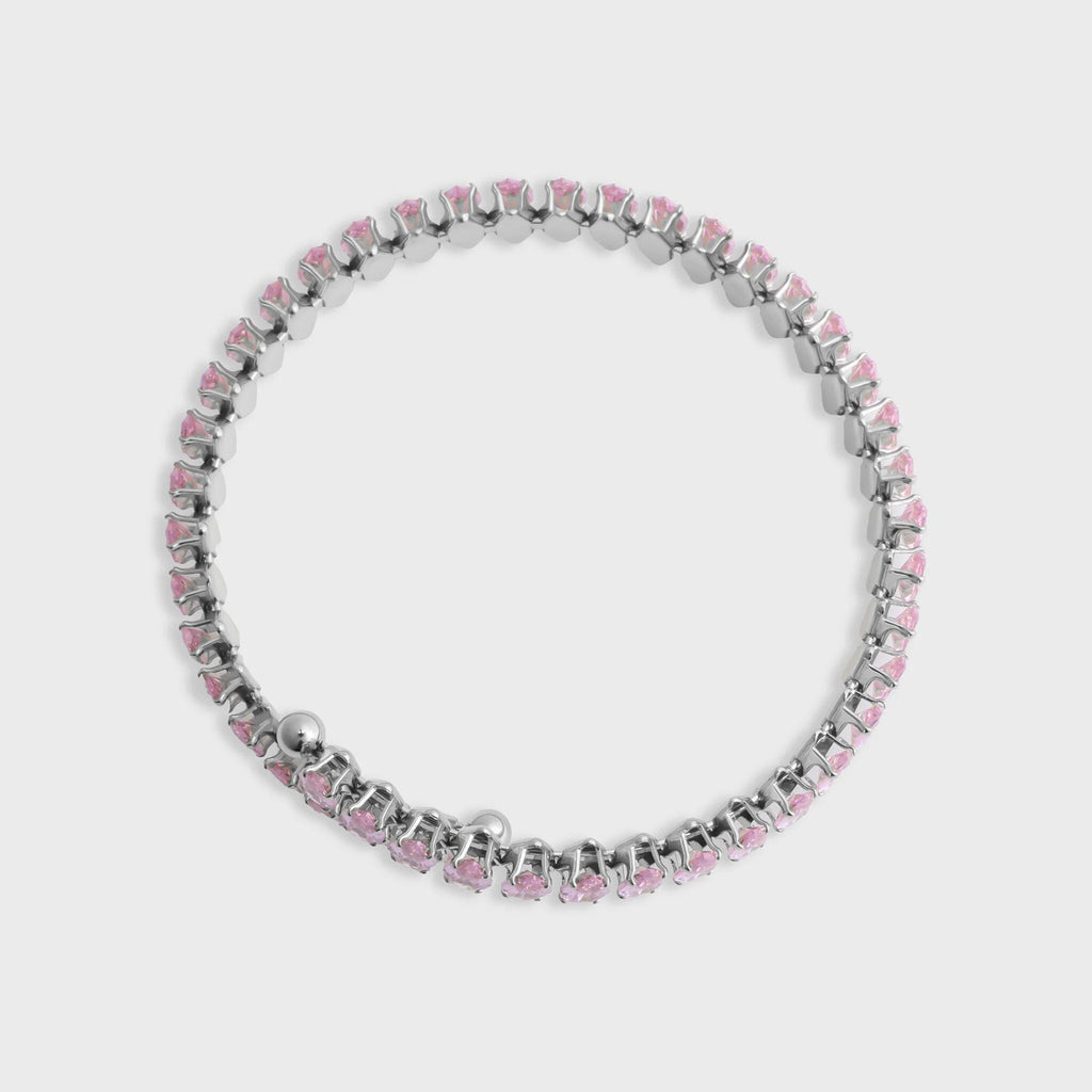 Bracelet with pink and silver beads on a light gray background