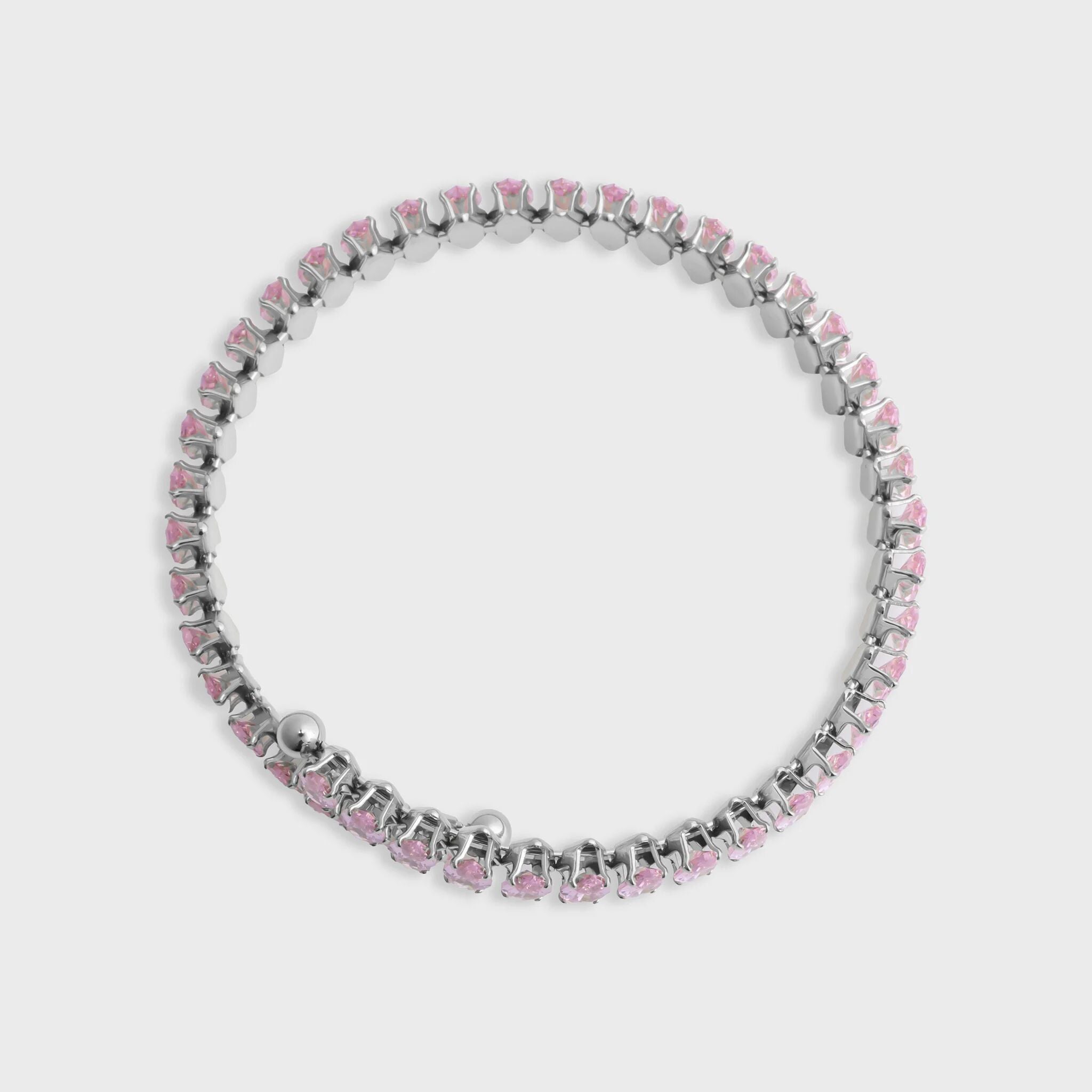 Bracelet with pink and silver beads on a light gray background