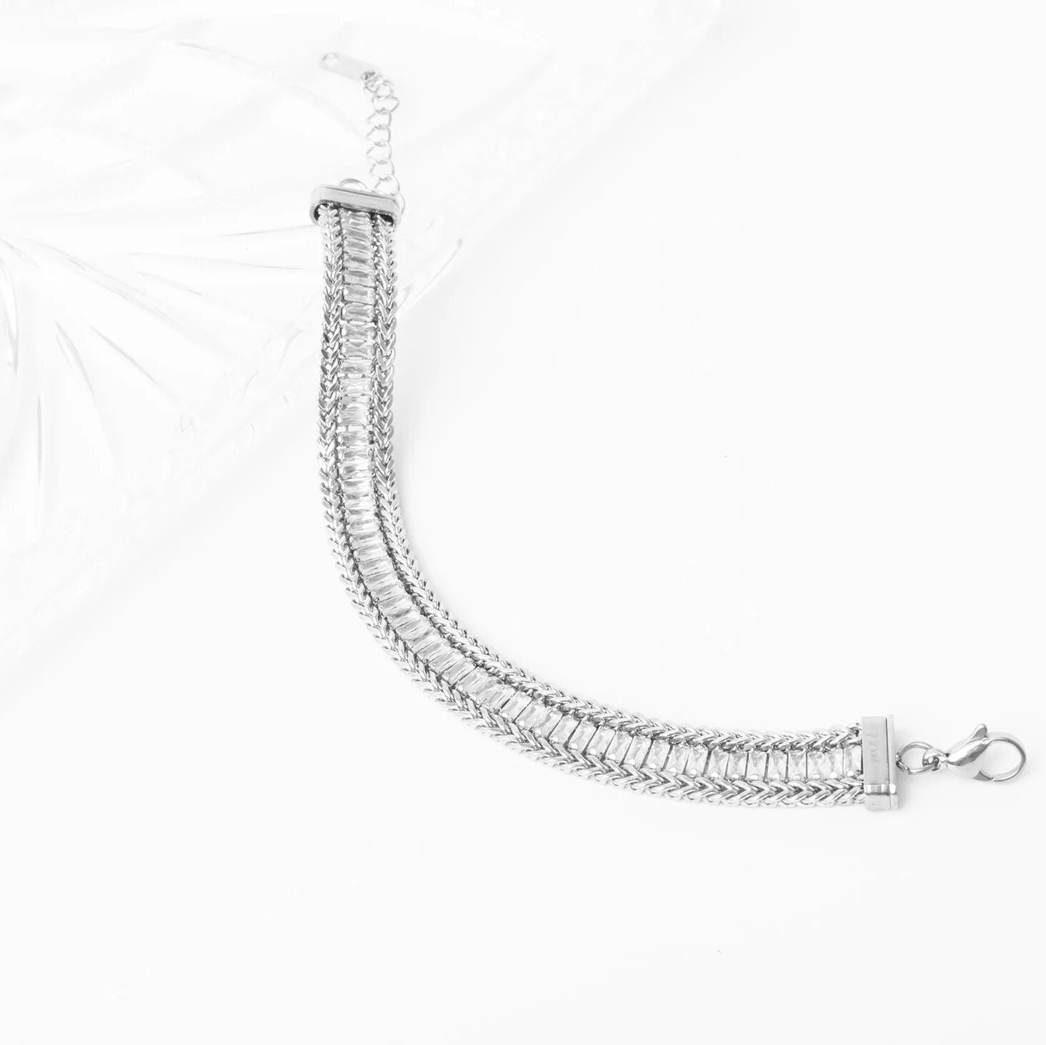 Silver bracelet on a white background