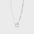 The Destin Necklace displayed on a white background, featuring a split chain design with freshwater pearls and Stainless Steel paperclip links, joined by a round charm holder clasp