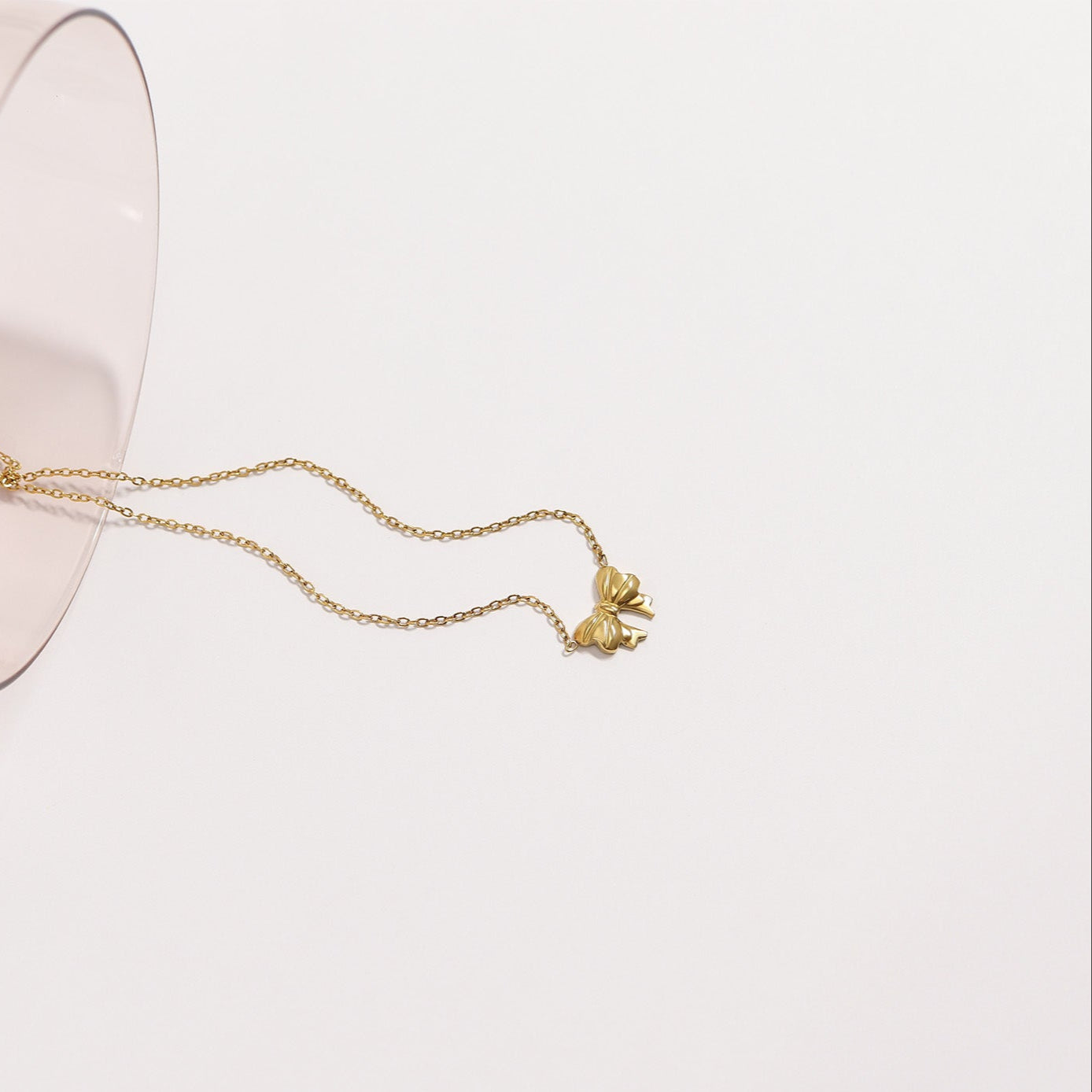Silver Bow Pendant Necklace