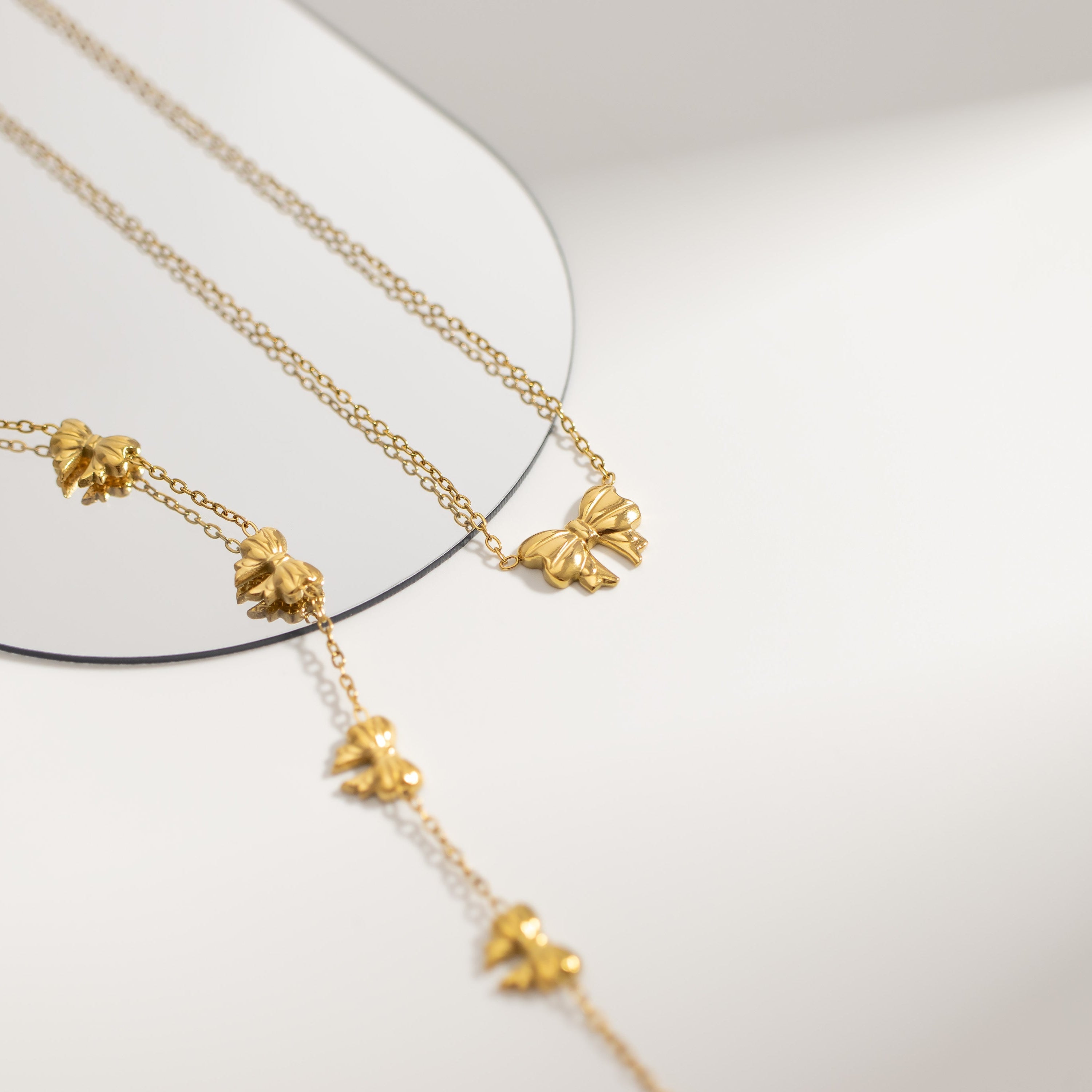 Gold Bow Station Bracelet & Necklace
