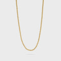Gold beaded chain necklace on a light gray background