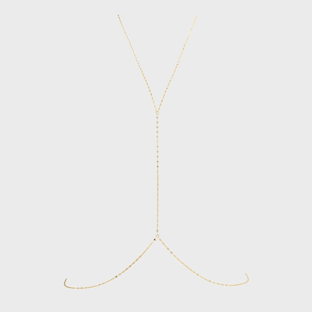 Gold Full Body Lip Chain on a light beige background