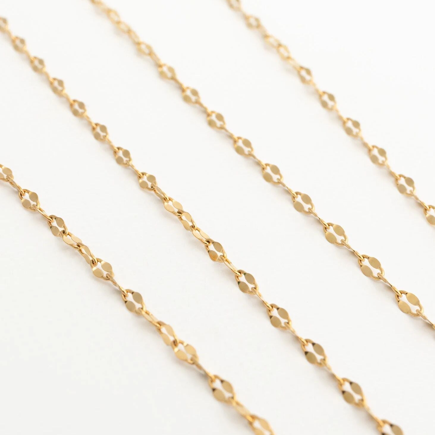 Gold Full Body Lip Chain on a white background
