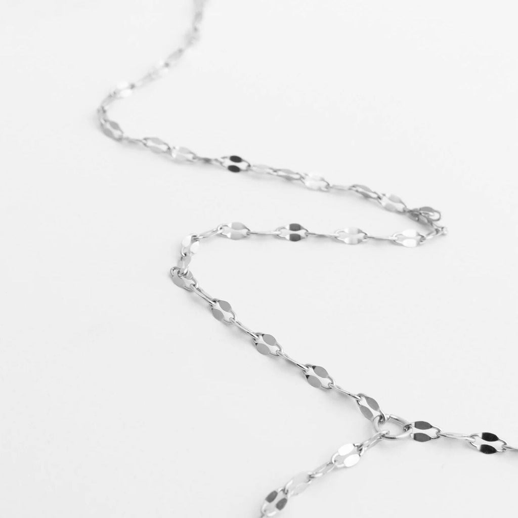 Silver Full Body Lip Chain on a light gray background