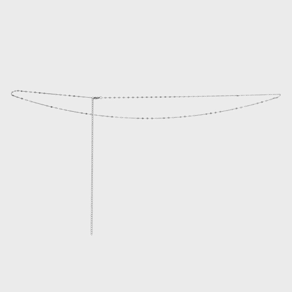Silver Lip Belly Chain on a light gray background