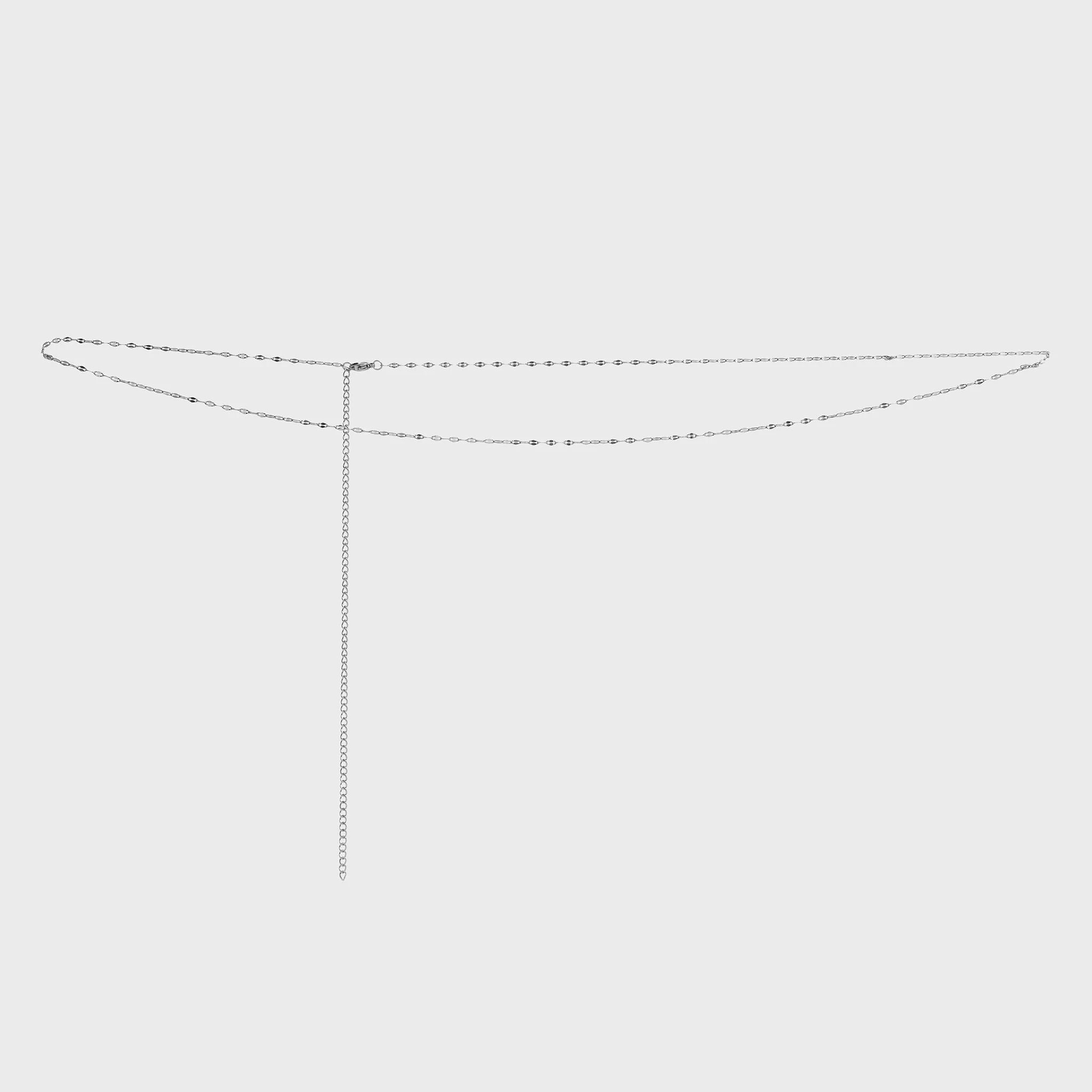 Silver Lip Belly Chain on a light gray background