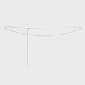 Gold Singapore Belly Chain on a light gray background