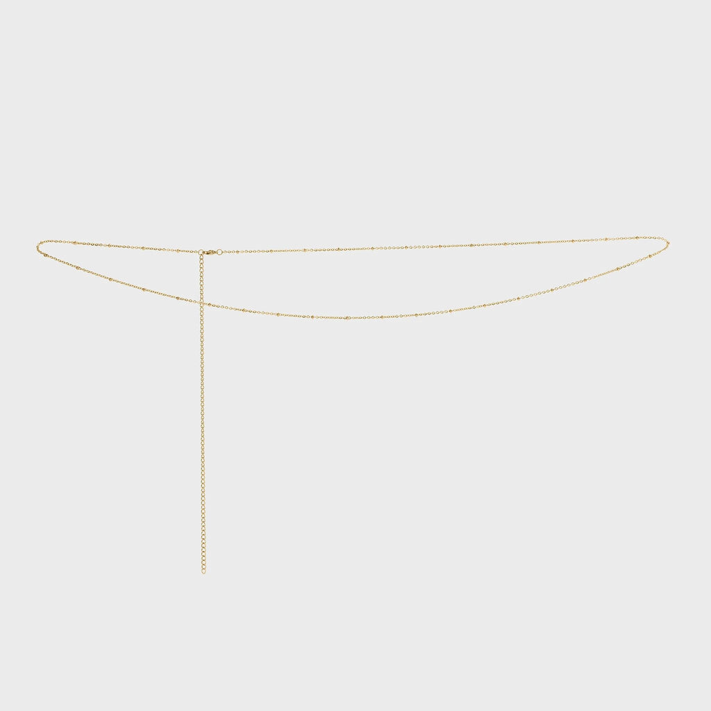 Gold Satellite Belly Chain on a light gray background
