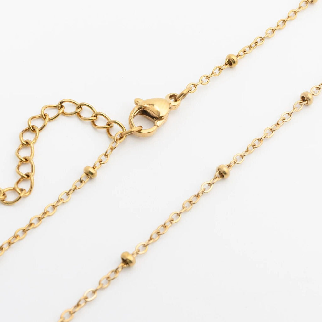 Gold Satellite Belly Chain on a white background