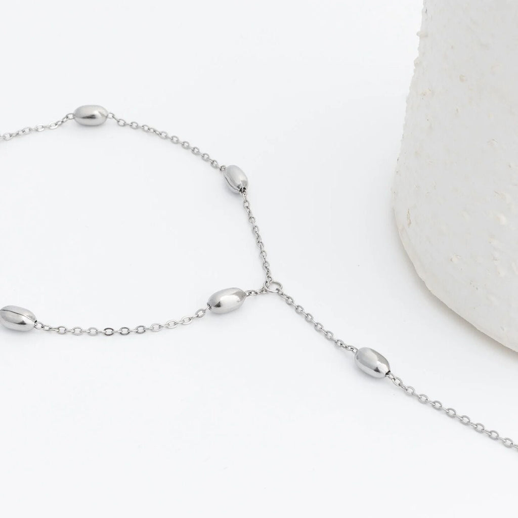 Silver Statement Bead Hand Chain on a white background