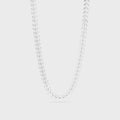 Silver necklace with leaf-like pendants on a light gray background