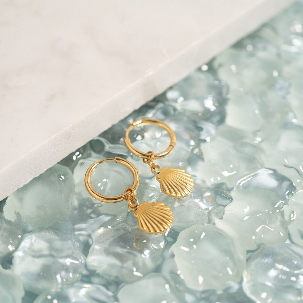 shell charm huggie earrings