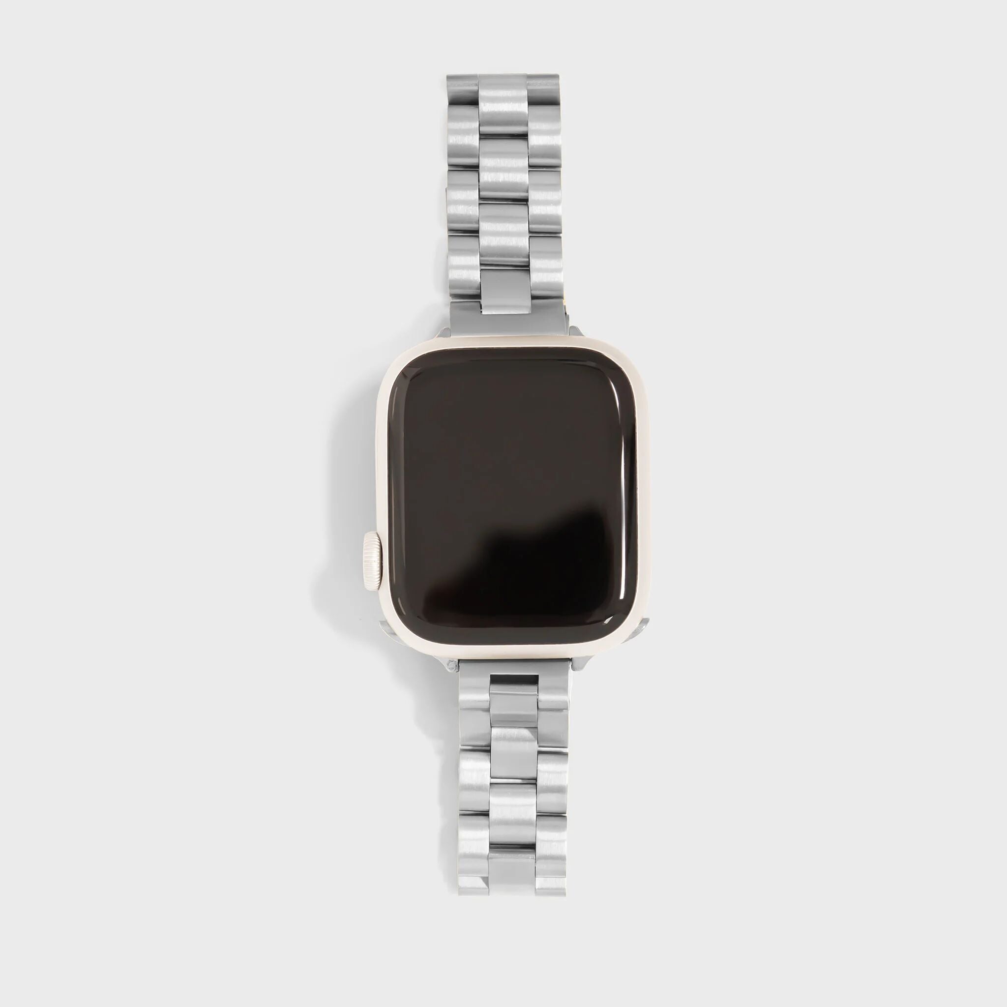 Smartwatch with a silver metal band on a light gray background