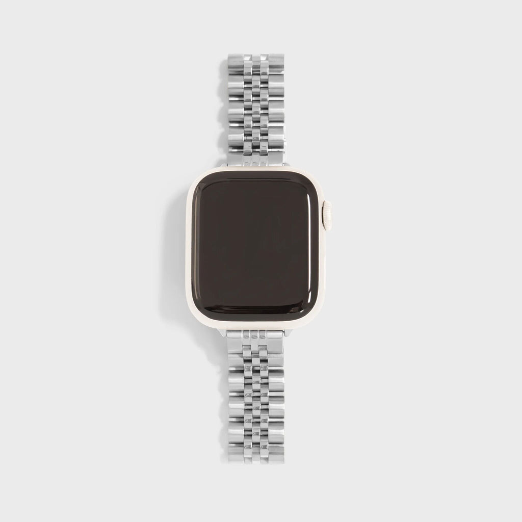 Smartwatch with a silver metal band on a light gray background
