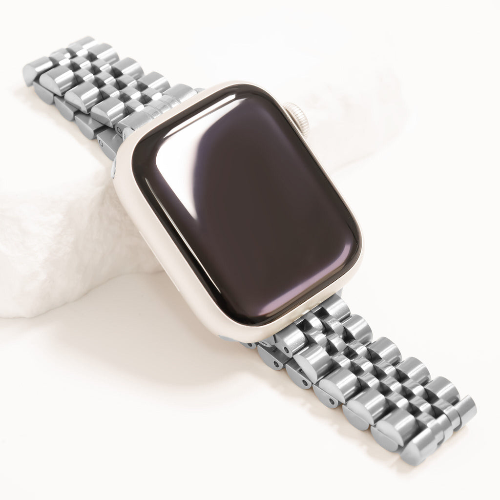 Smartwatch with a silver metal band on a white background