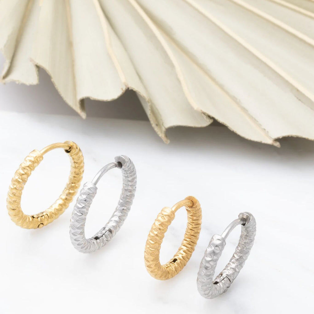 Textured Huggie Hoop Earrings-gold and silver studio scale shot 