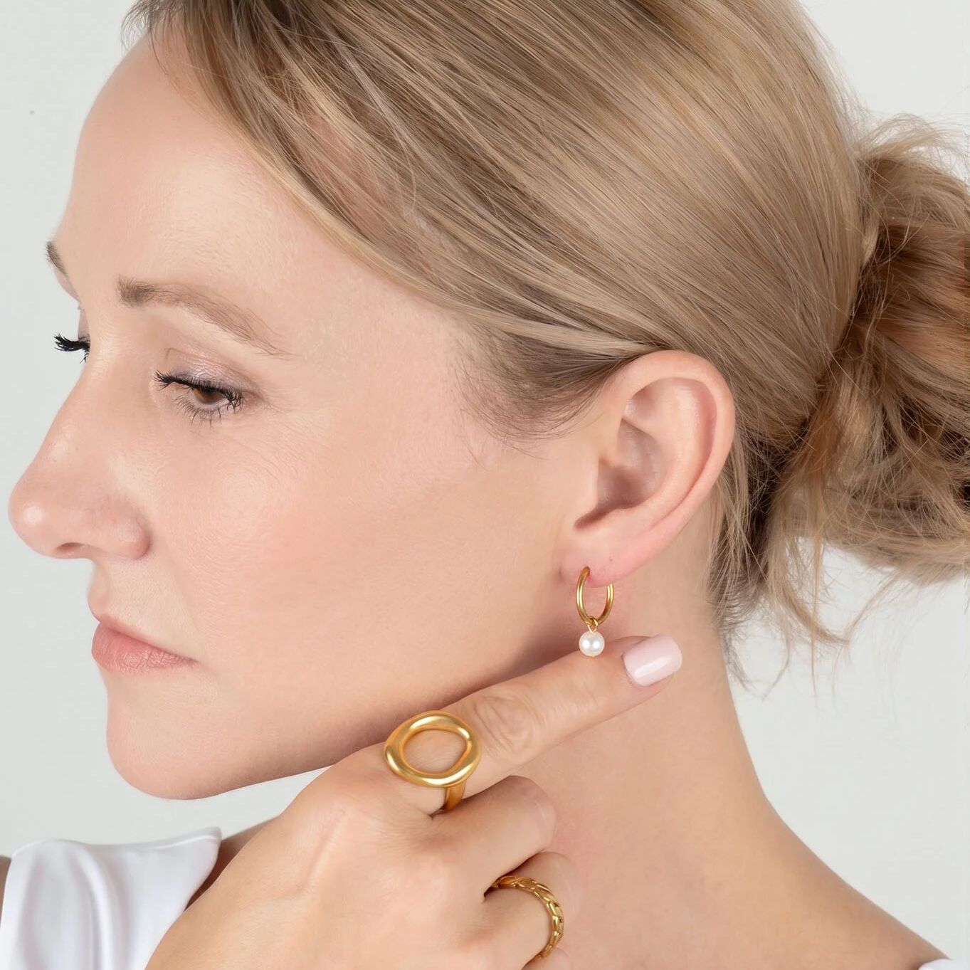 Pearl Charm Huggie Earrings- gold model 