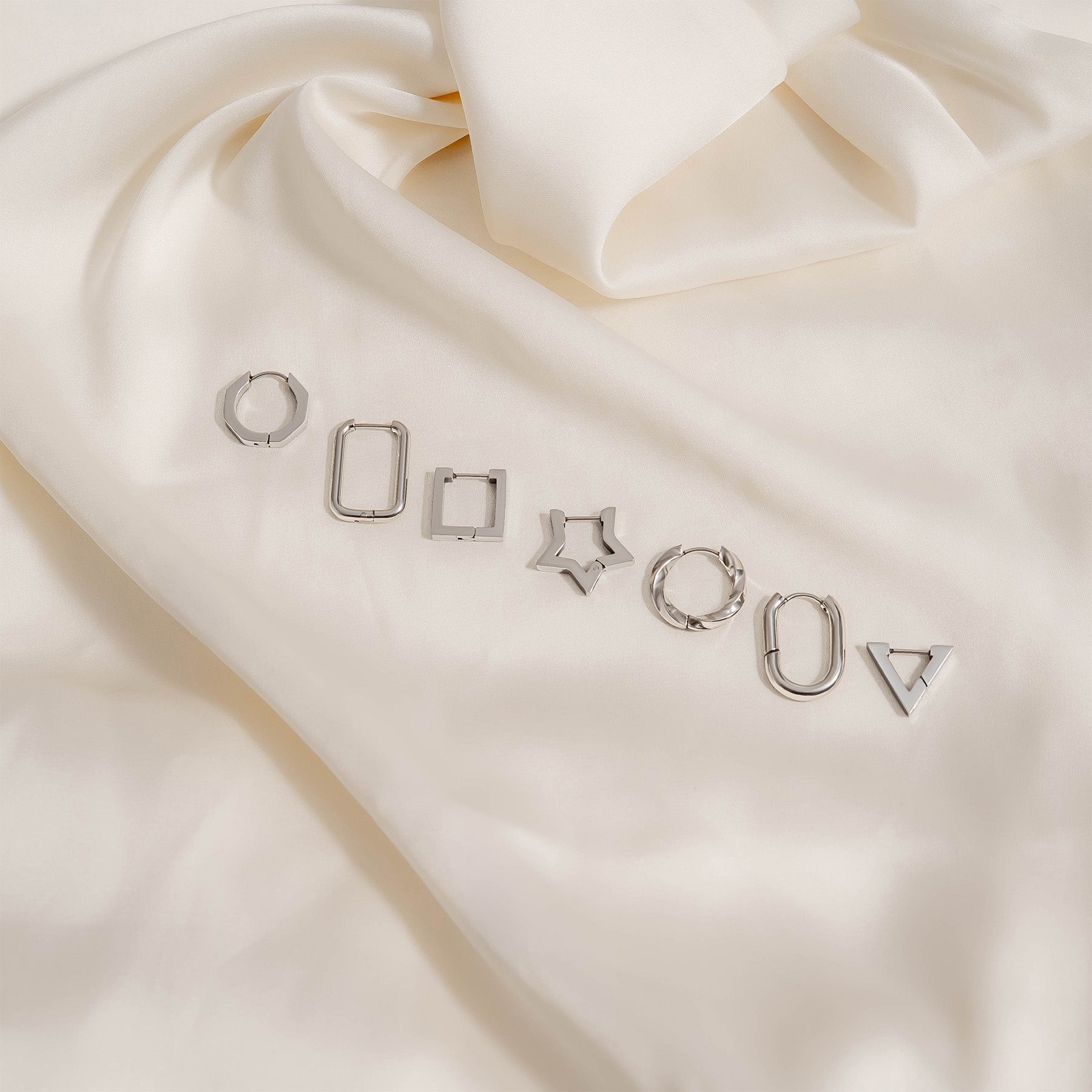 Born To Be A Star Huggie Earrings- silver collection shot 