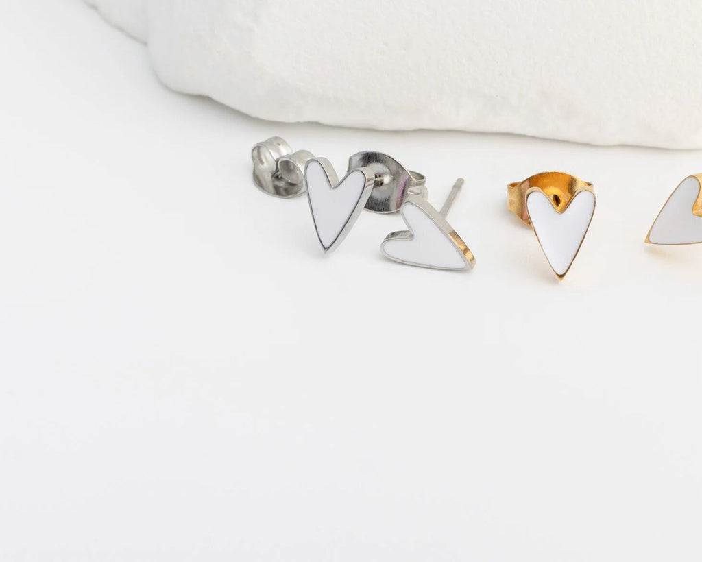 Heart-shaped earrings on a white background