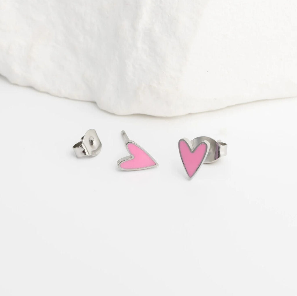 Heart-shaped earrings on a white background