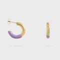 Gold hoop earrings with purple accents on a white background