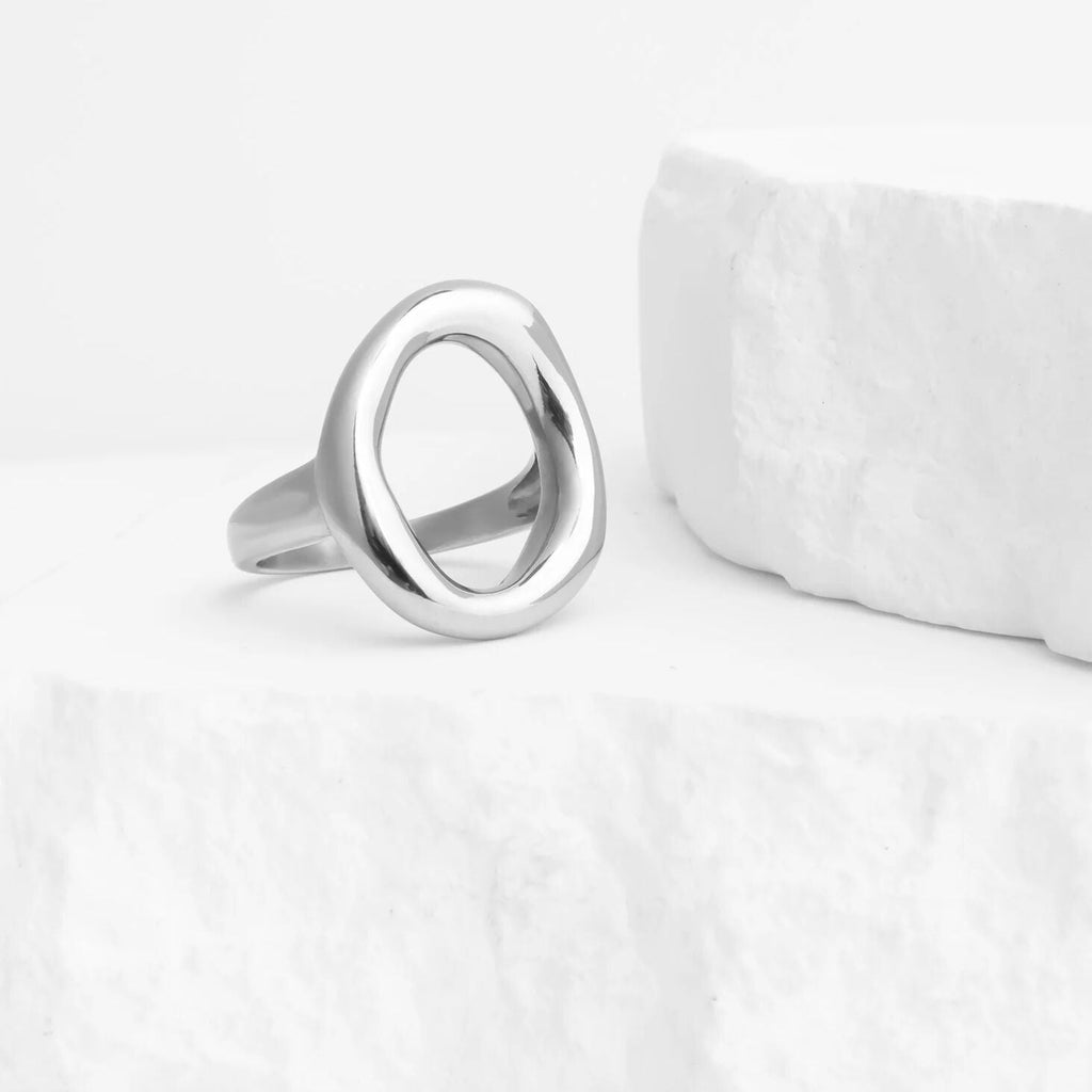 Silver ring on a white background