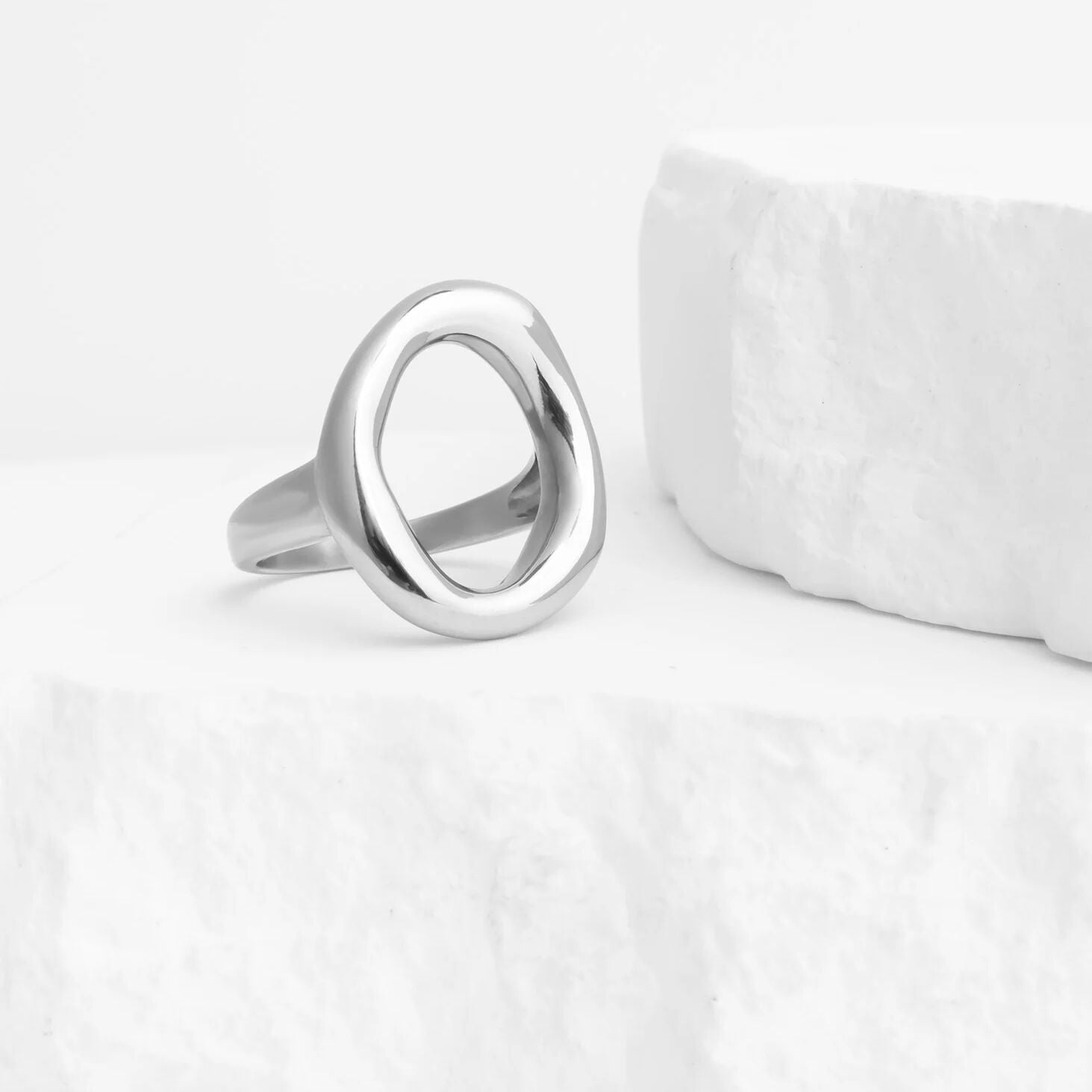 Silver ring on a white background
