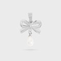 Silver bow-shaped pendant with a pearl on a white background