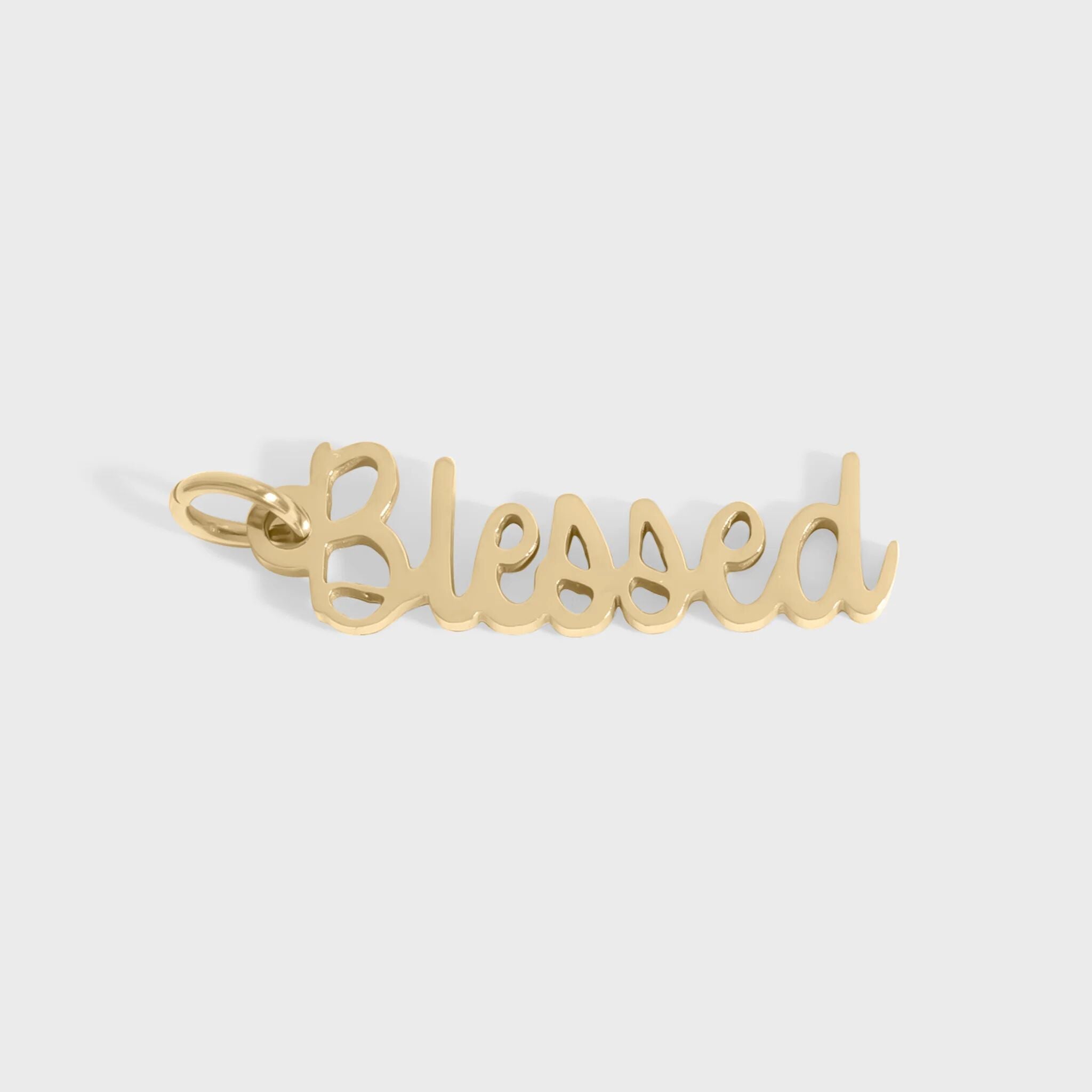 Gold 'Blessed' pendant on a white background