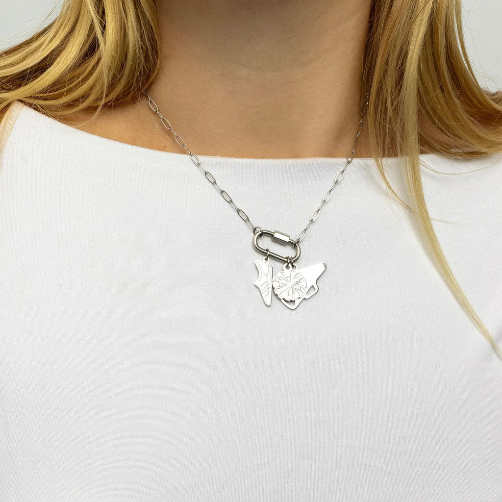 Silver necklace with a butterfly pendant on a white background