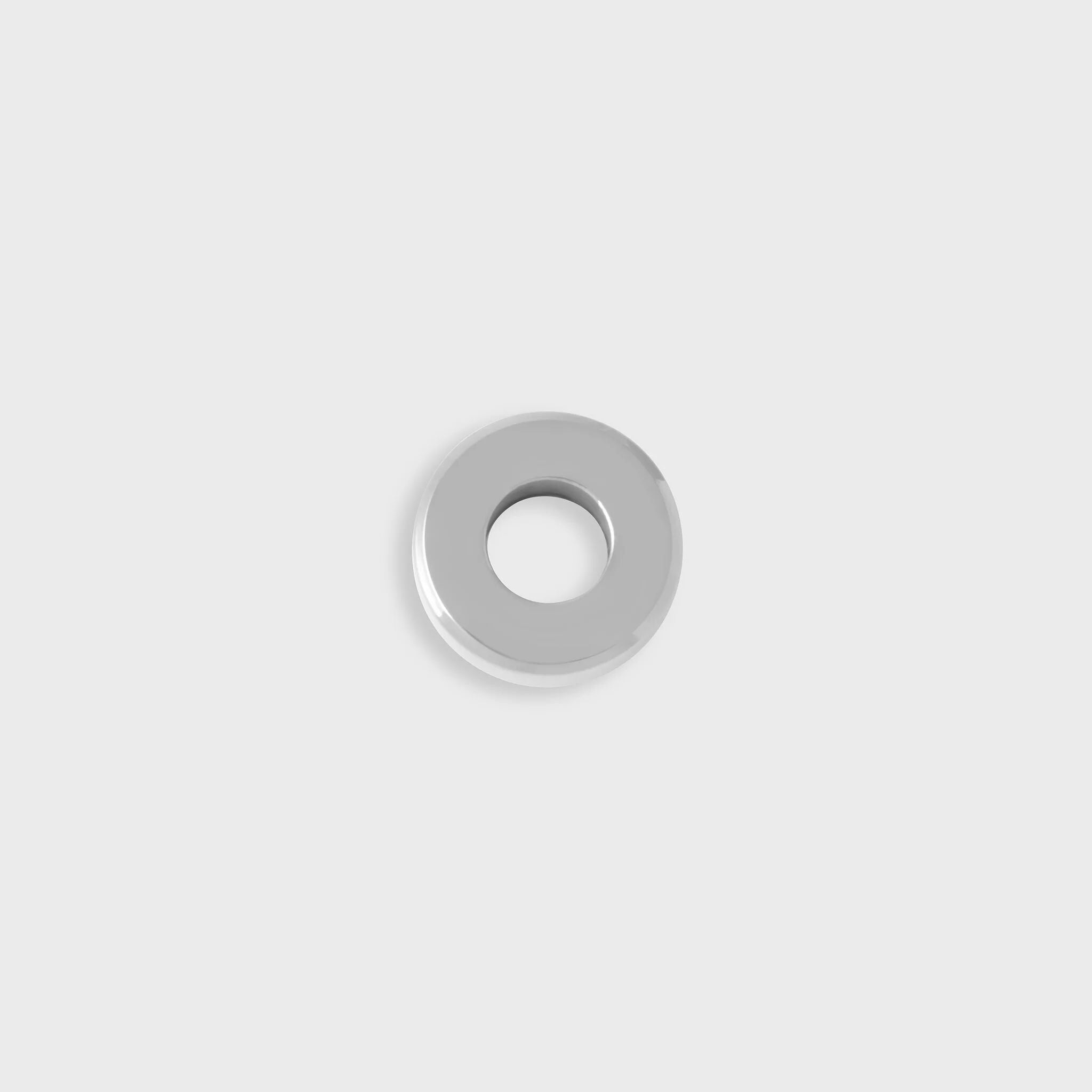 Silver spacer bead on a light gray background