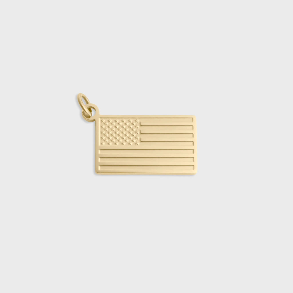 Gold American flag pendant on a light gray background