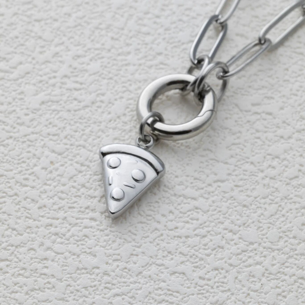 Silver necklace with a pizza slice charm on a light gray background
