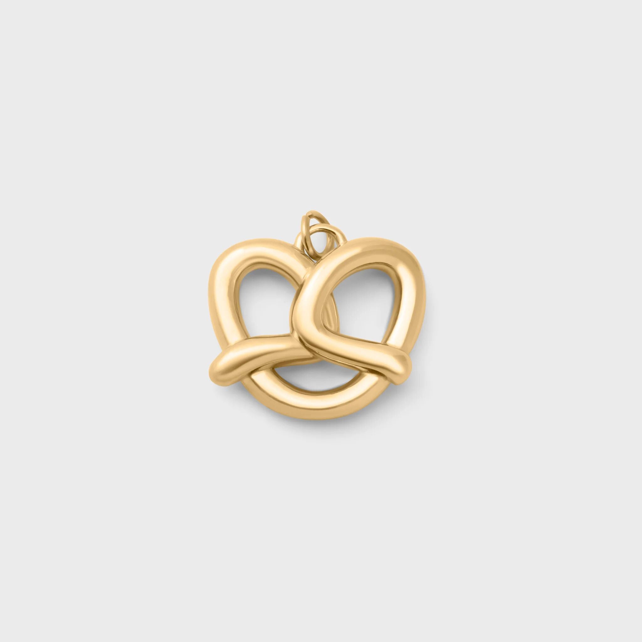 Gold pretzel pendant on a light gray background