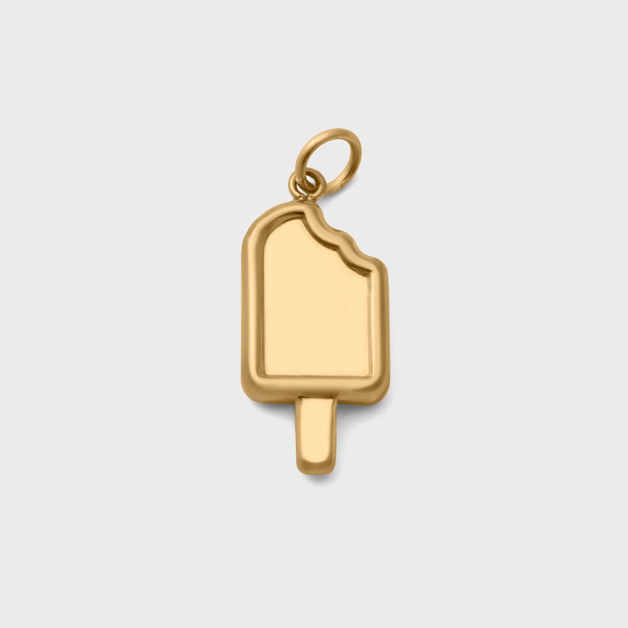 Gold popsicle pendant on a light gray background