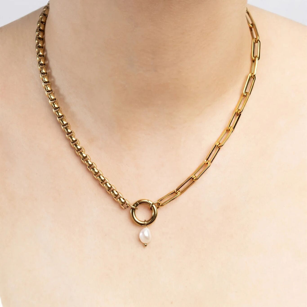 Gold chain necklace with a pearl pendant