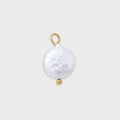 Pearl pendant with gold accents on a light gray background