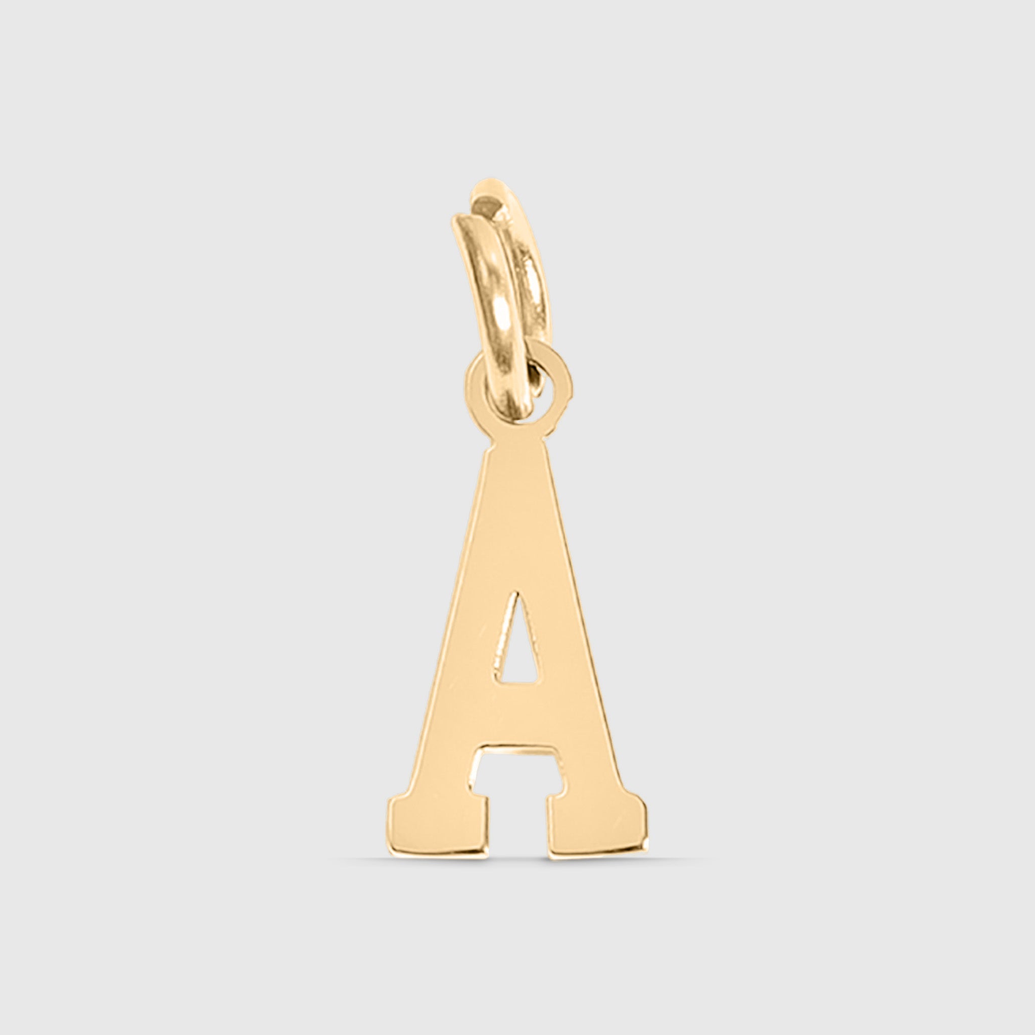 Gold letter 'A' pendant on a light gray background