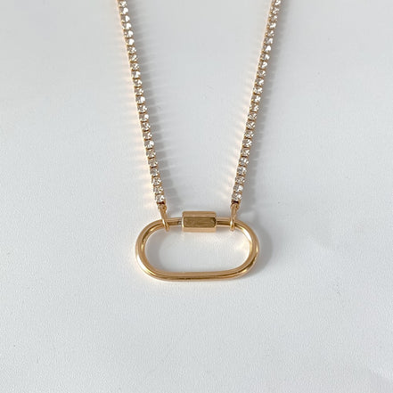Ayla Clasp Necklace in gold tone featuring pearl accent